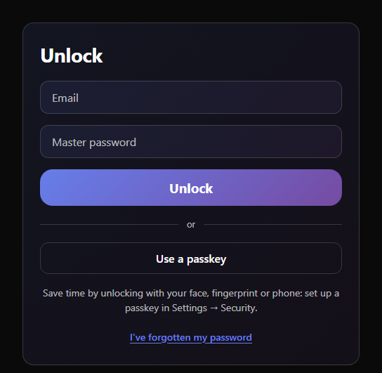 The unlock card, with a password field and a Use a passkey option.